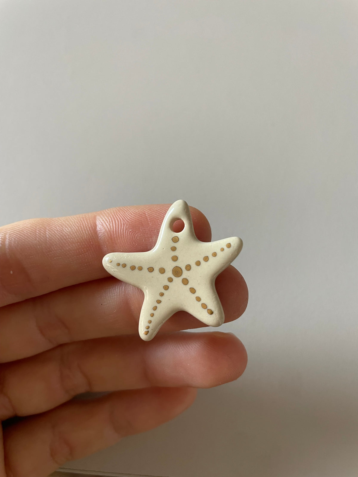 Piezas Exclusivas | Charm estrella oro anilla oro; Charm burdeos anilla oro